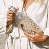 Made By Minga Jessy Water Bottle Holder -Cheap Swim Sales Store Made by Minga Woven Water Bottle Holder01 1296x 46f5e5d3 d09a 4045 acd2 efce80d21851